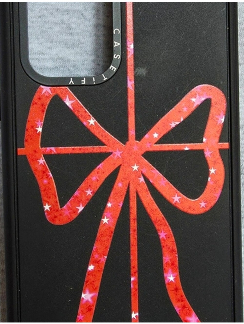 Samsung Ultra 22 Casetify Black Case with Sparkling Red Bow Graphic